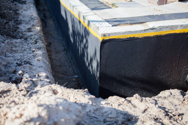 Professional Waterproofing technician working in Canandaigua, NY
